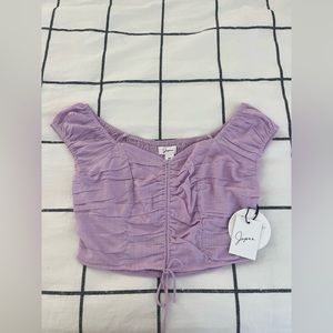 Purple cute blouse NEVER WORN with tags!!